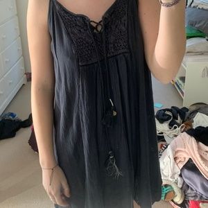 grey dress with lace and tie details